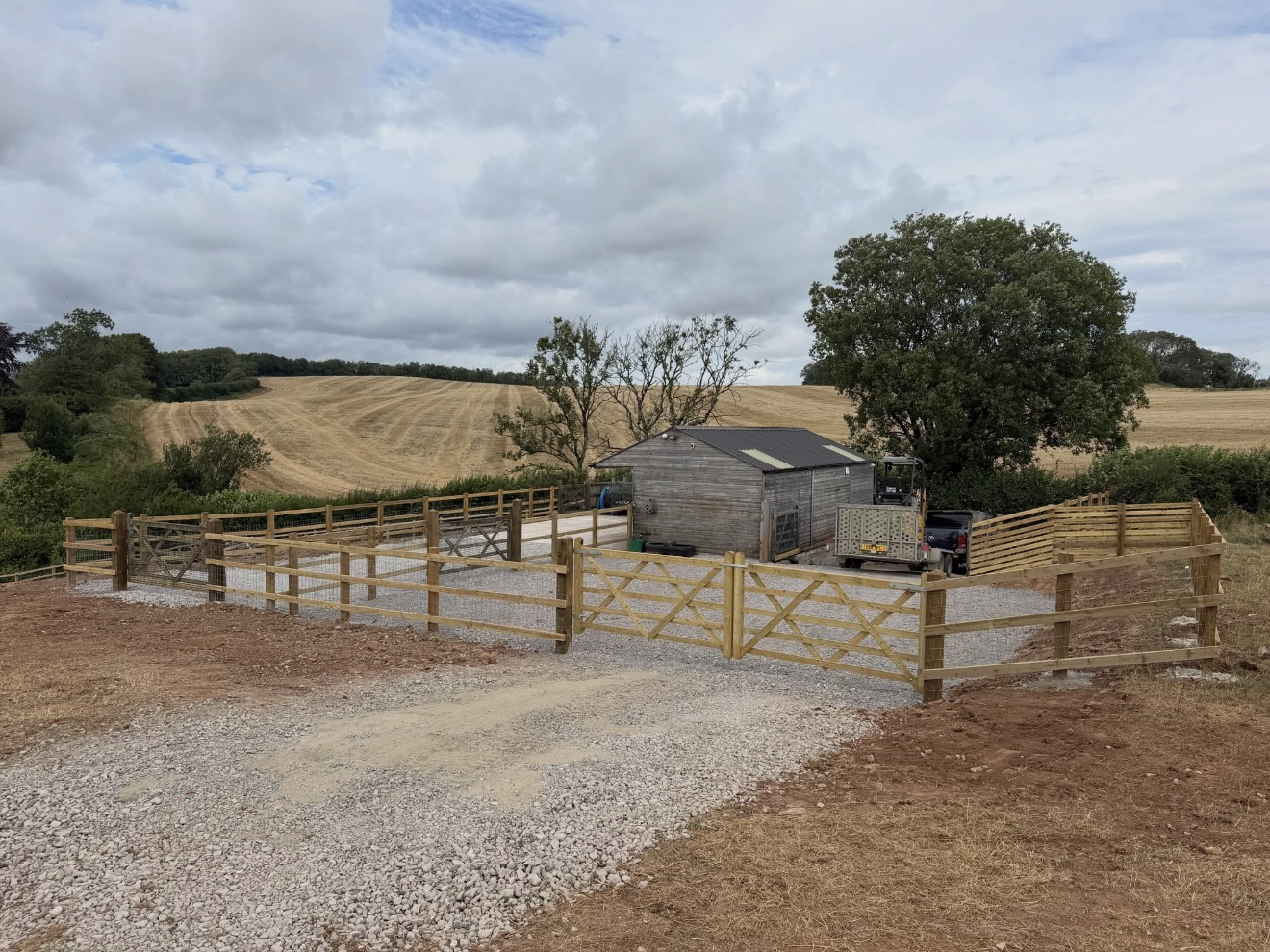 Timber gates and fencing at a rural site
