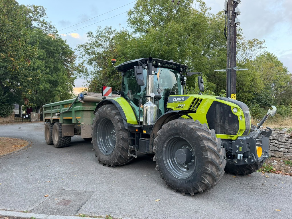 Claas tractor and tipping trailer