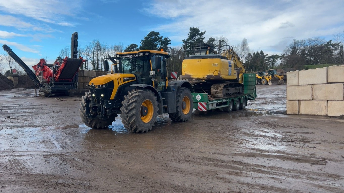 Large excavator loaded for transport